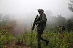 mexican-soldier-carries-flamethrower.jpg